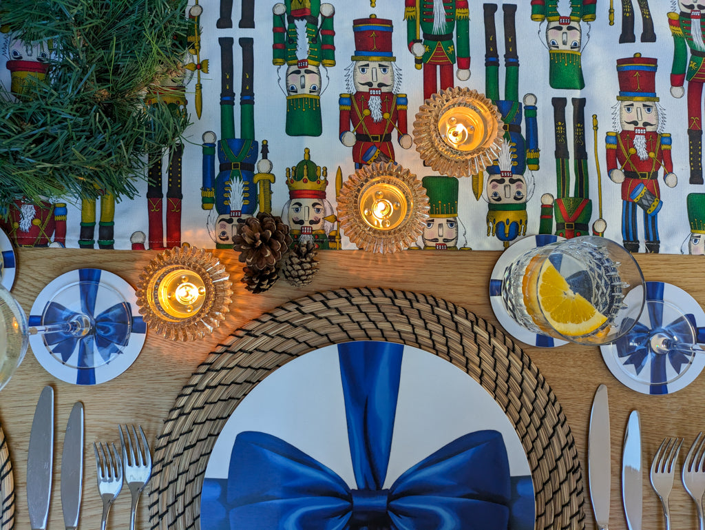 Blue ribbon tableware with Nutcracker table runner - a colourful festive inviting laid table