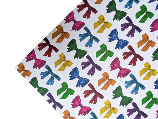 Colourful bow pattern wrapping paper on a white background