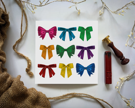 Rainbow colourful bow card with fairy lights, wax seal and hessian santa sack