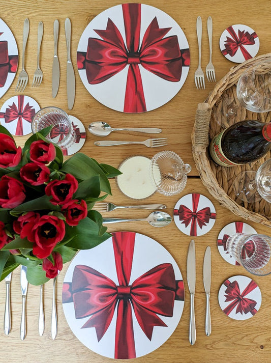 Romantic red ribbon tablescape with red wine and tulips