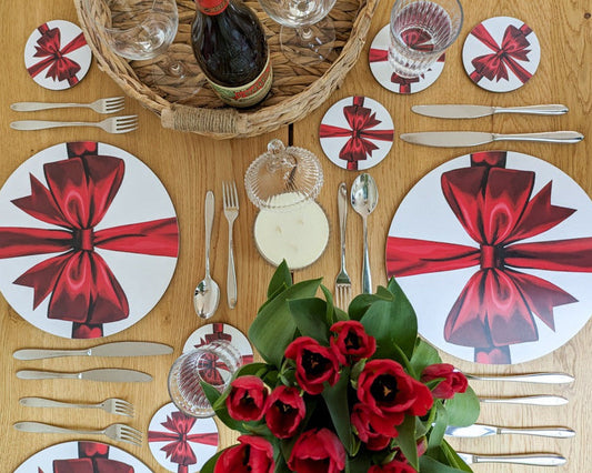 Romantic red ribbon tablescape with red wine and tulips