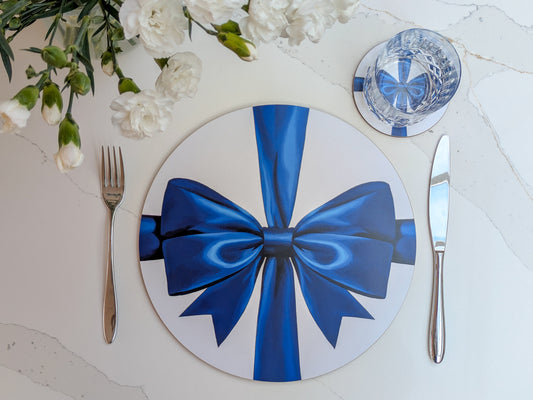 Bold electric Blue nova placemat and coaster set in ribbon bow design with spring flowers and bright setting