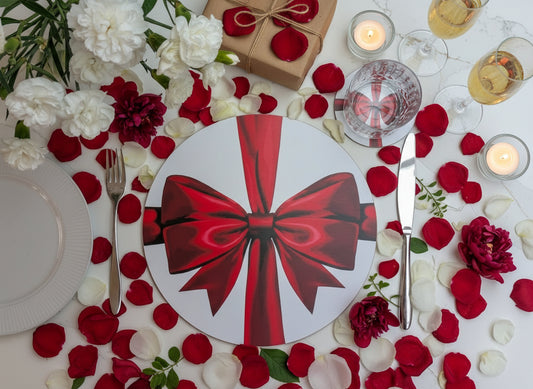 Warm Red ribbon placemat and coaster set shown on a bright marble table with fresh cut flowers, Summer romantic vibes
