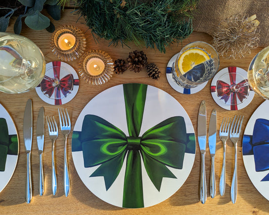 Cosy tablescape with Green, red and blue placemats and coasters