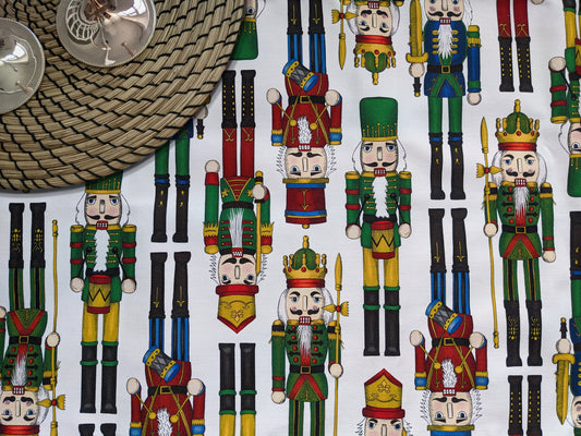 Close up image of the colourful Nutcracker illustrations on our table runner