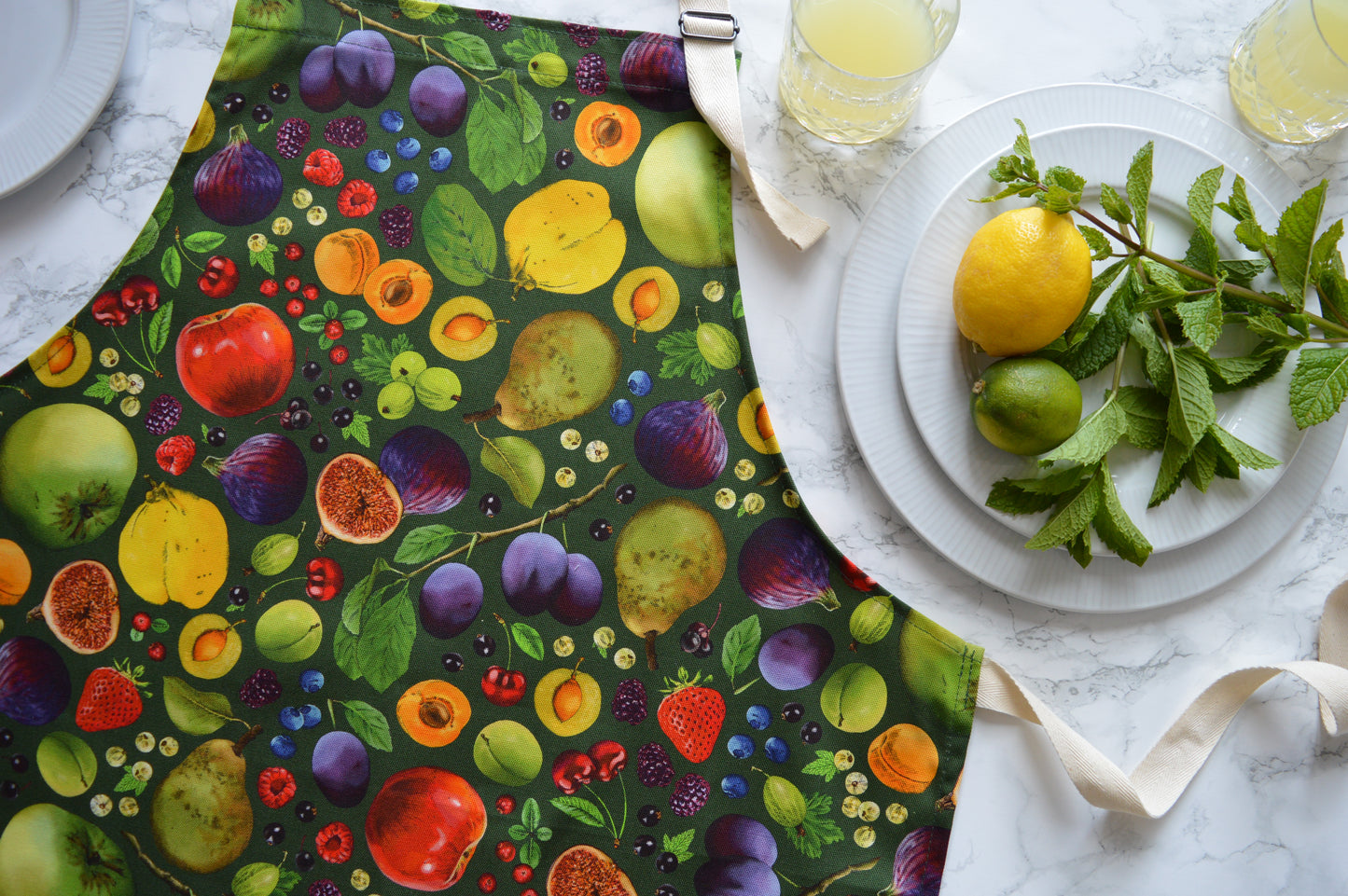 Vibrant fruit print apron, bold kitchen apron with fresh produce grown in the UK