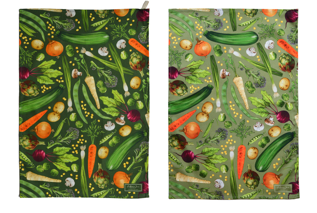 Cutout image of colourful vegetable illustrated tea towels, two pack