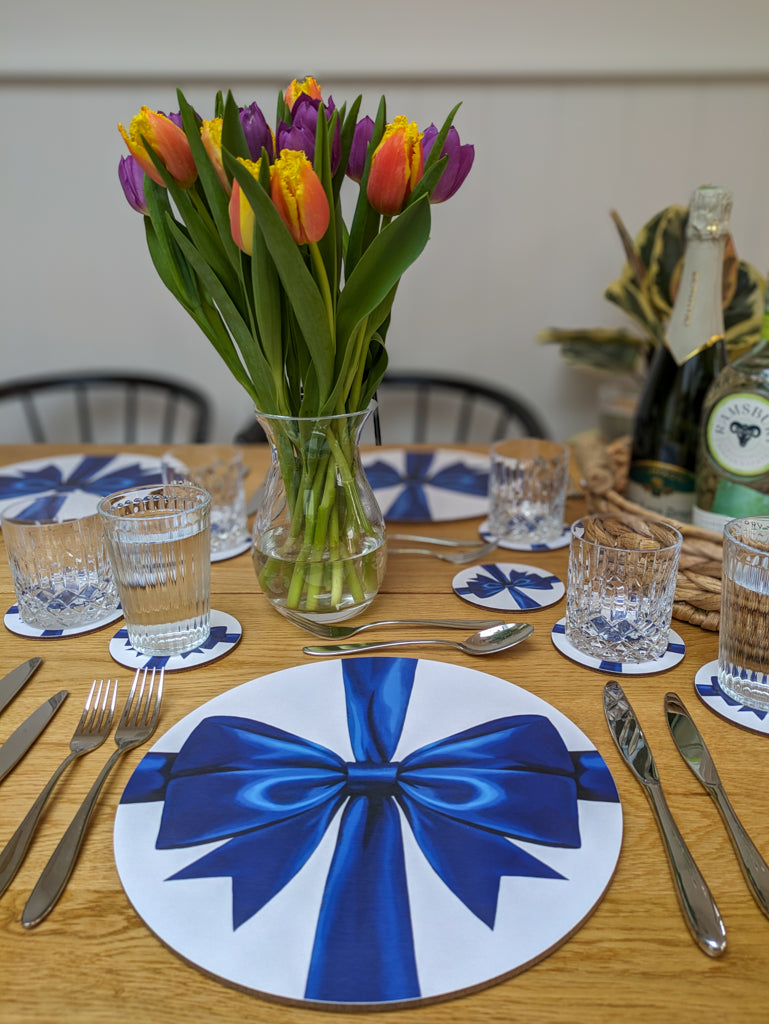Sitting tablescape with British blue ribbon table mats