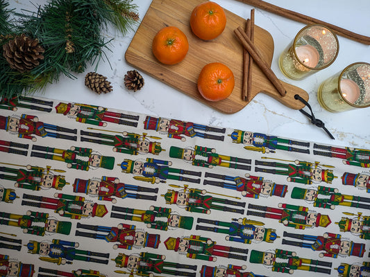 Colourful Christmas soldier tea towel pictured with Christmas decorations