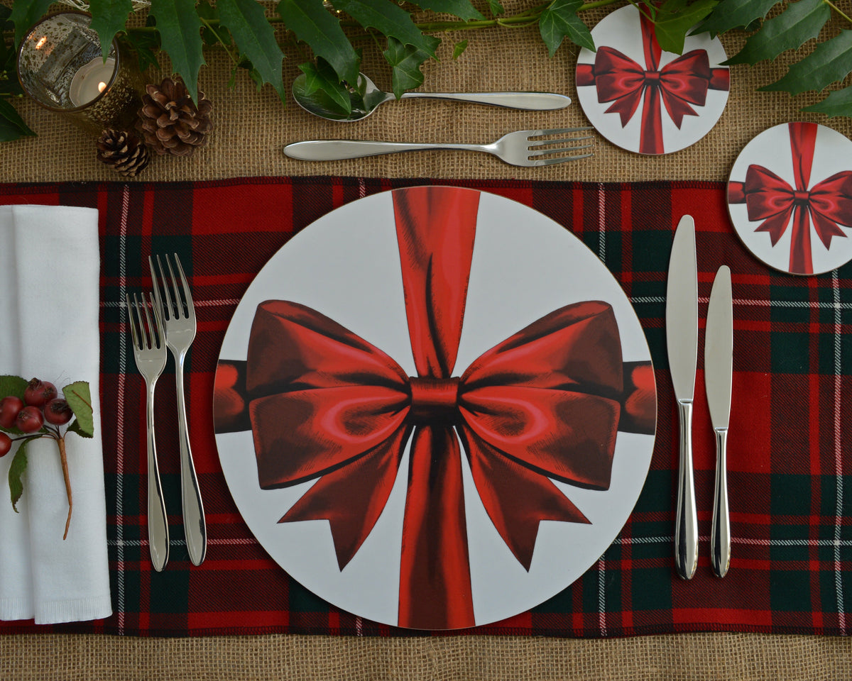 Christmas red ribbon placemat and coaster set on a festive tablescape 