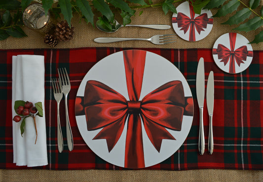 Christmas red ribbon placemat and coaster set on a festive tablescape 