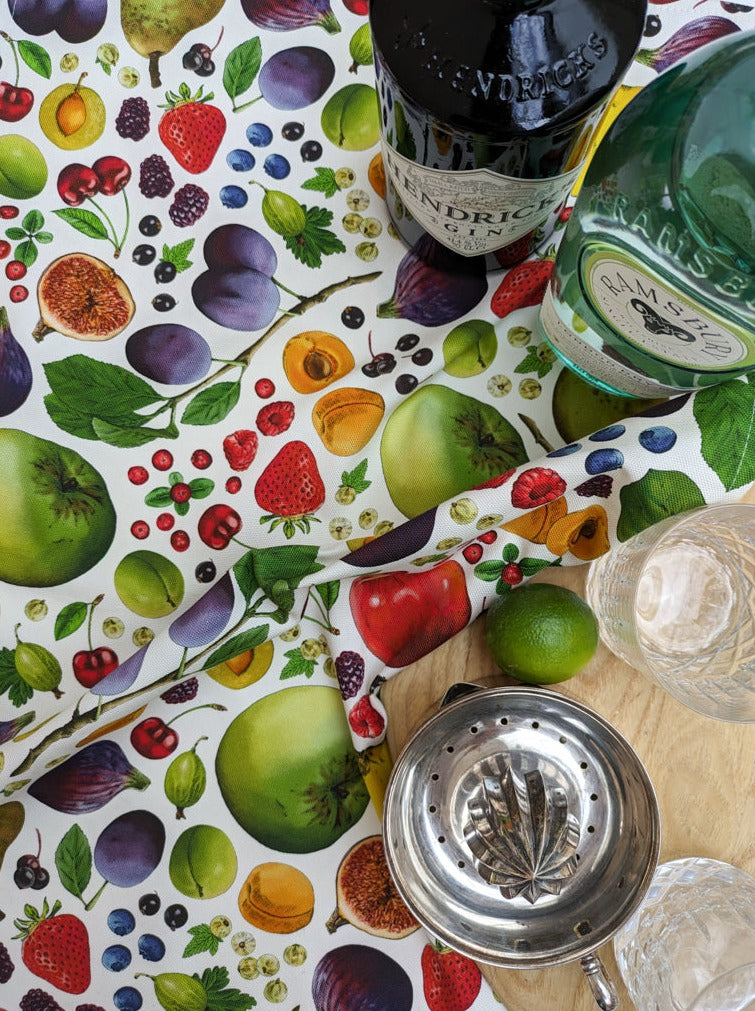 Colourful fruit illustrated tea towel with drinks preparation