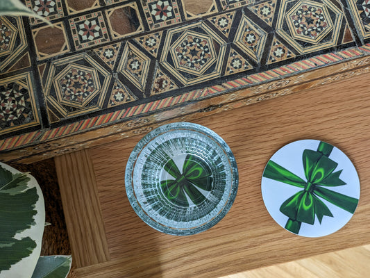 Green ribbon coasters on coffee table