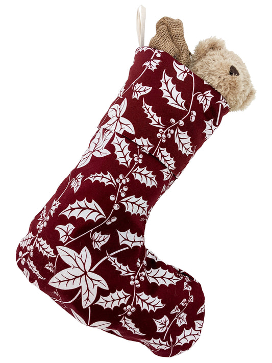 Cutout image of Holly and Ivy patterned Christmas stocking hanging