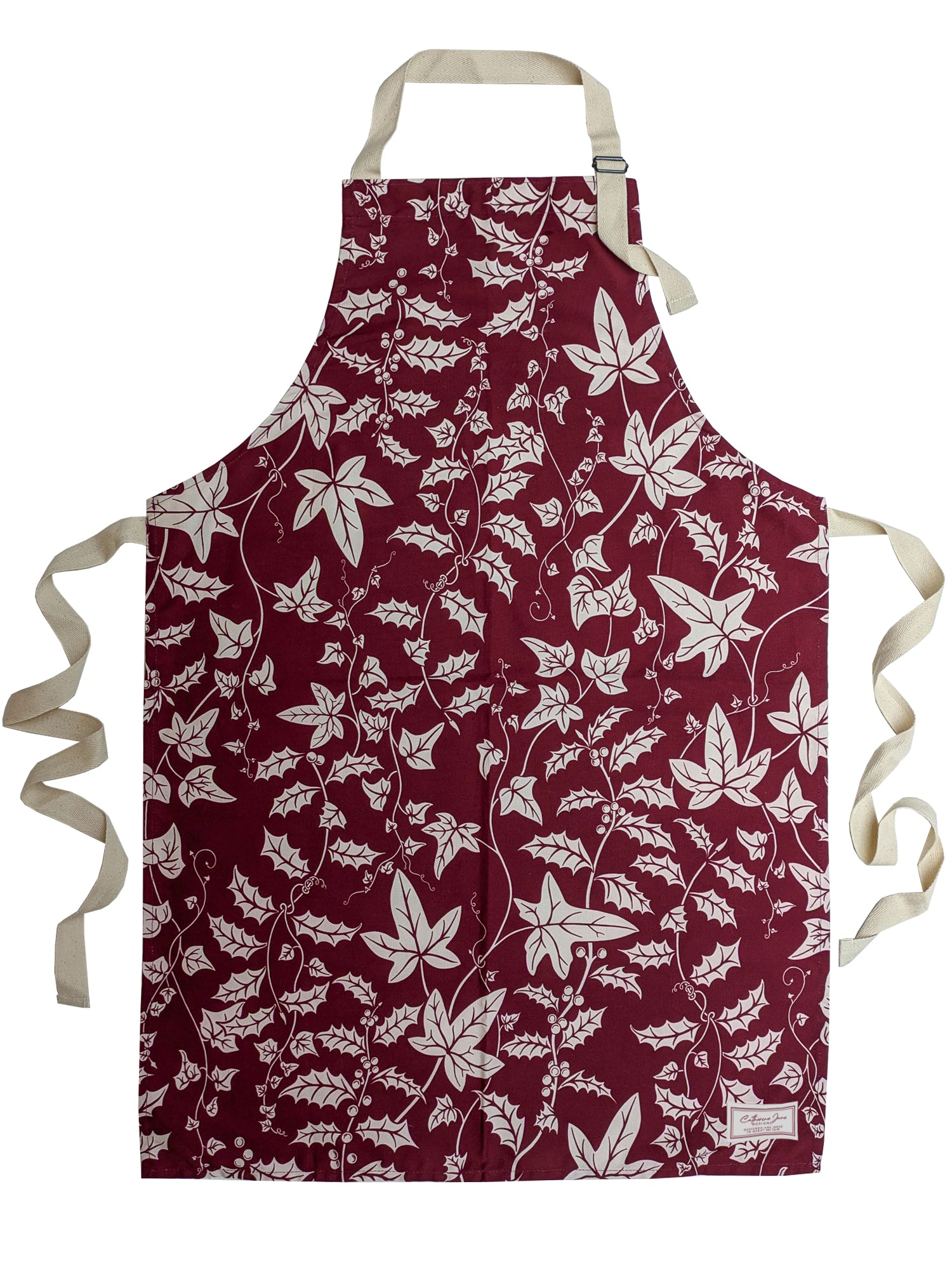 Cutout image of Holly and Ivy patterned Christmas apron made in England