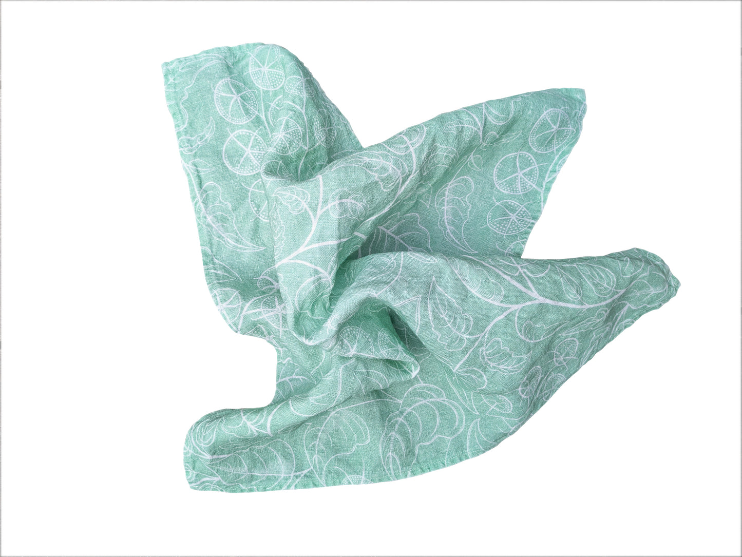 Folded light green napkin with a subtle tomato vine pattern on a white background
