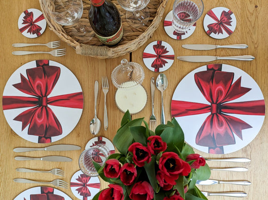 Romantic red ribbon tablescape with red wine and tulips 