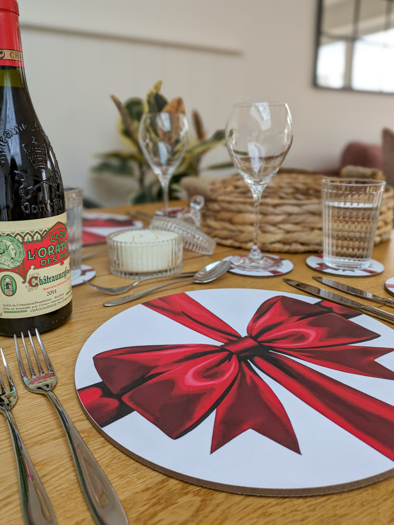 Close up of red ribbon placemat tablesetting