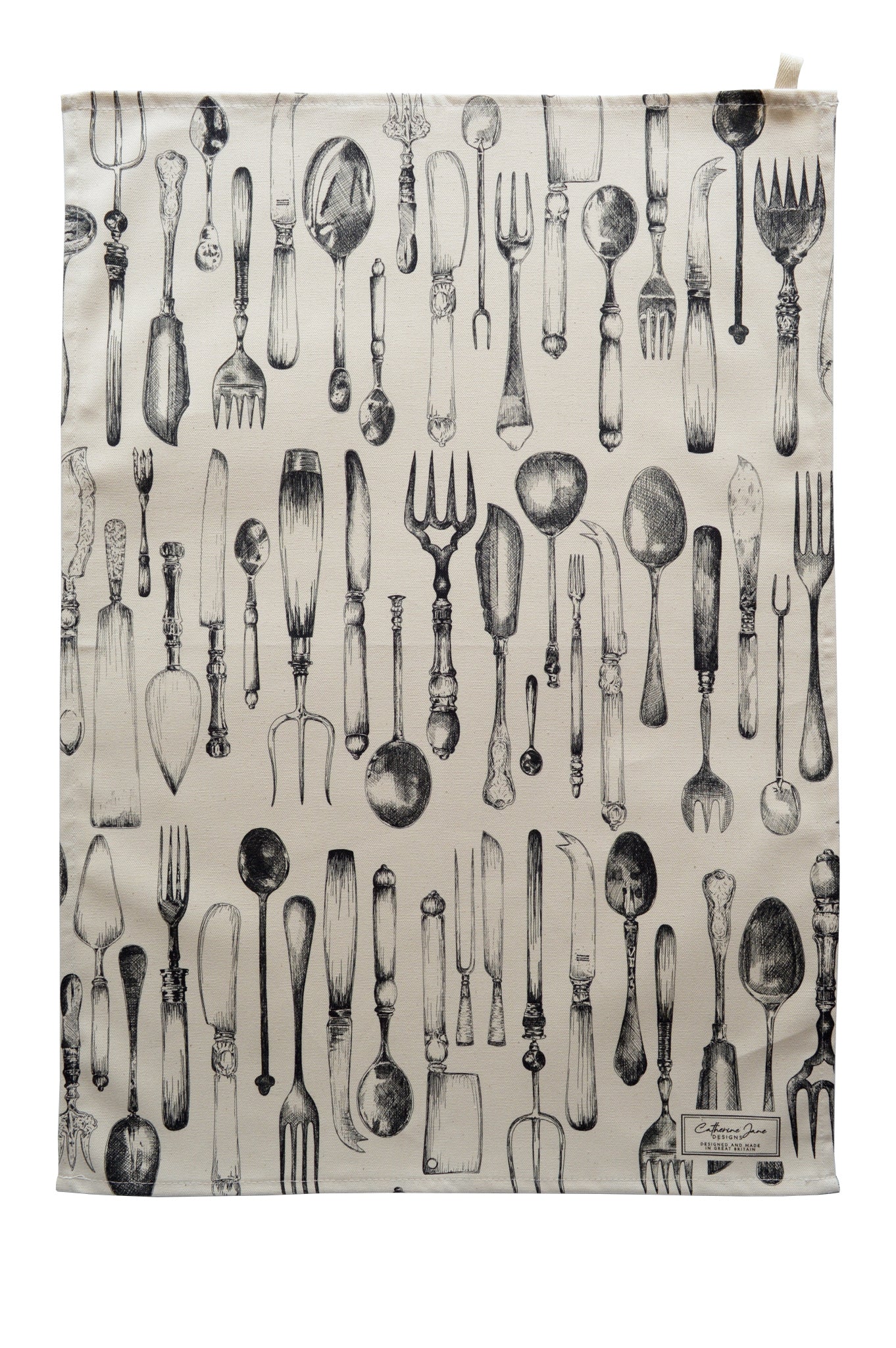 Cutout image of cutlery illustrations organised on a tea towel