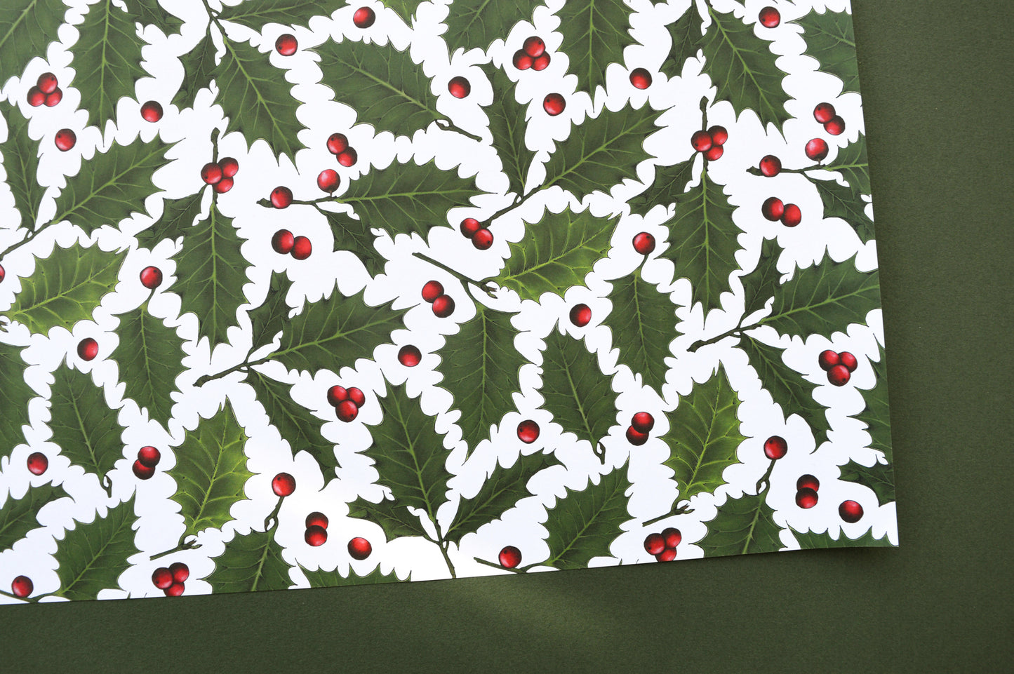 Holly and berry paper close up