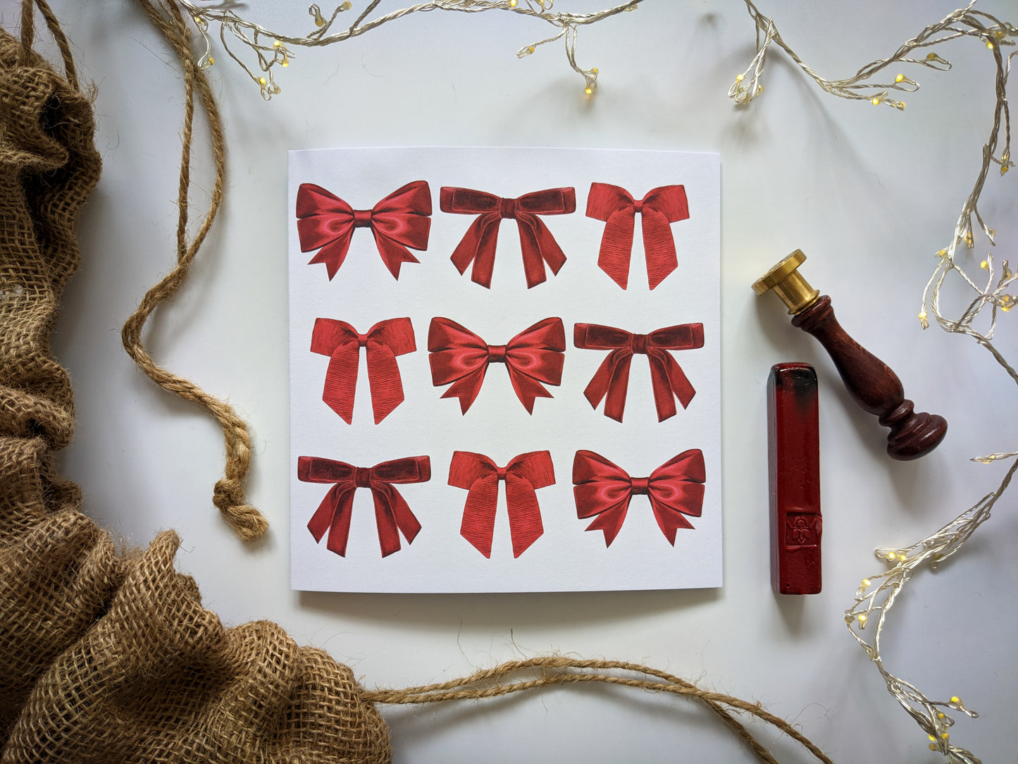 Festive mini Red ribbon card with festive props