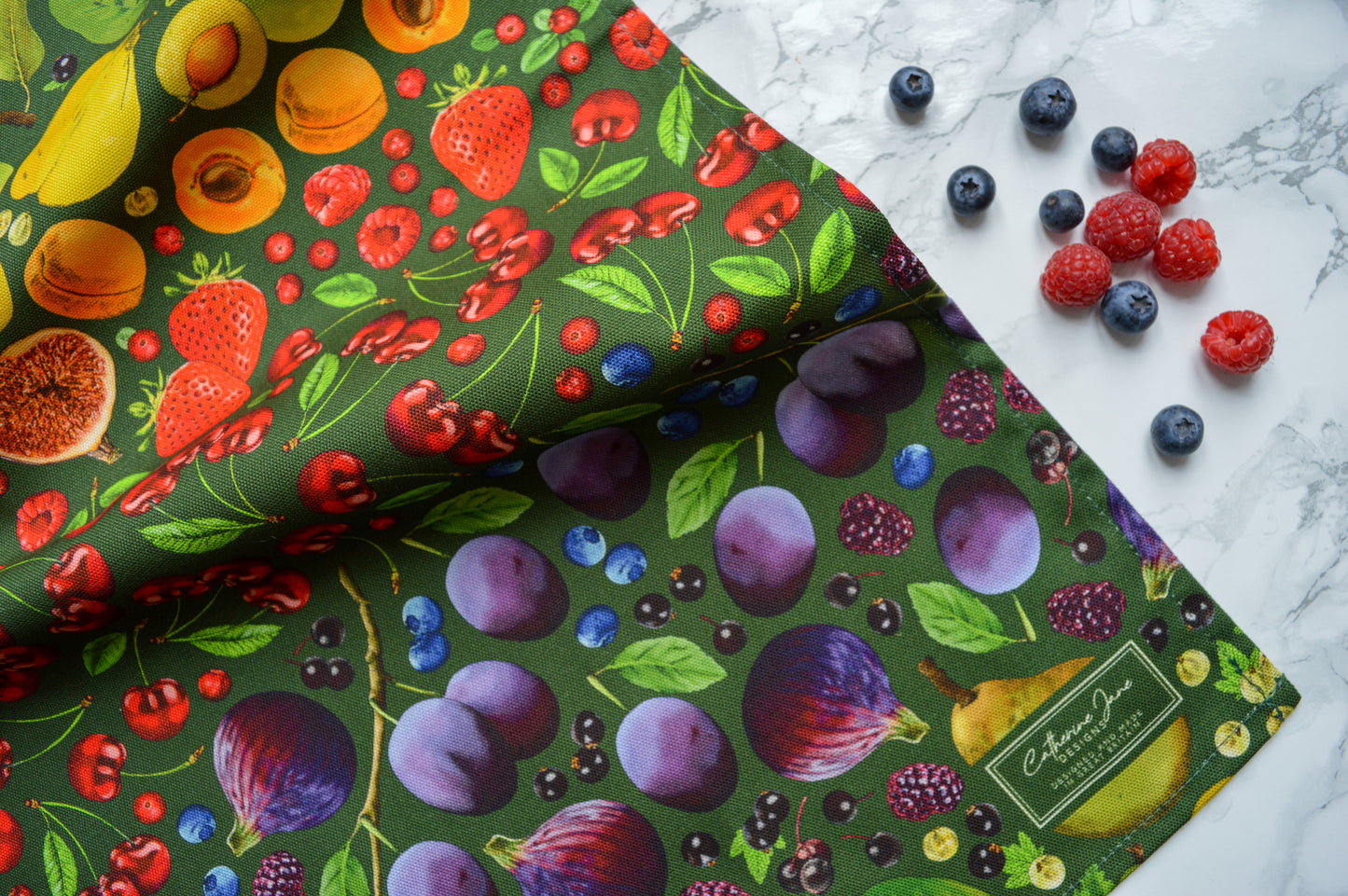 Rainbow fruit tea towel, Green background with fresh fruit