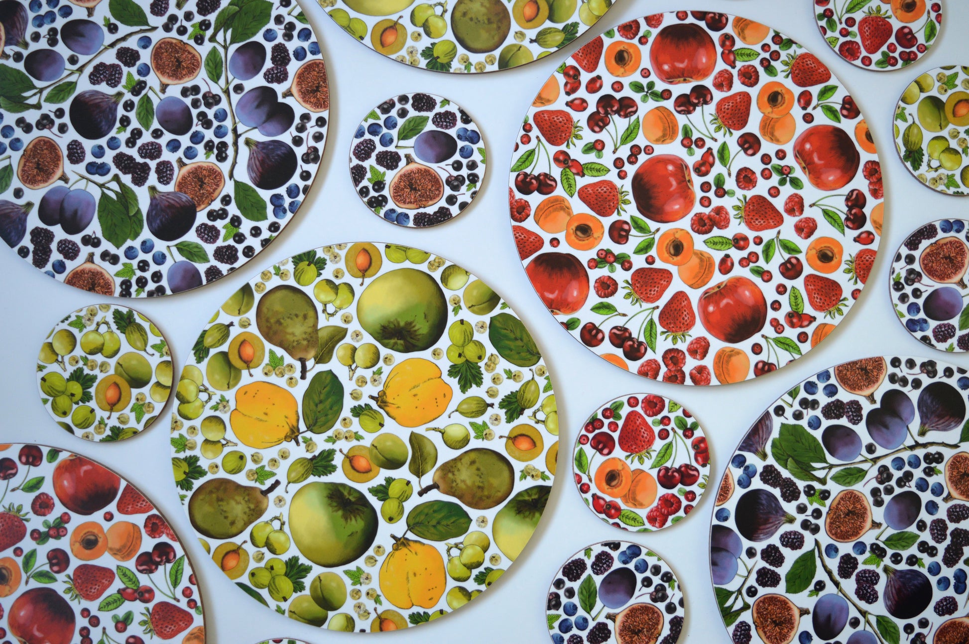 Bright fruit coasters and placemats