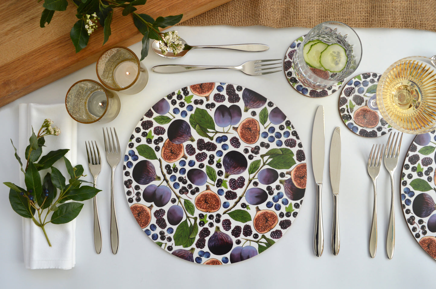 Purple and Blue fruit coasters on table